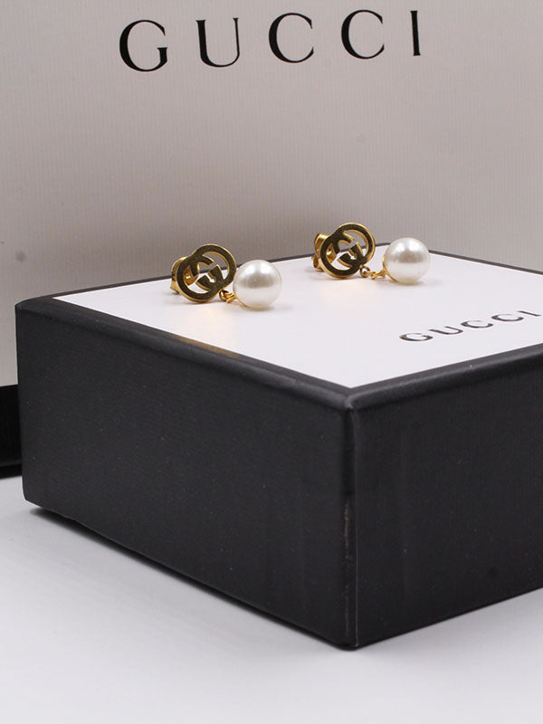 حلق قوتشي لولو ميتال ذهبي حلق gucci