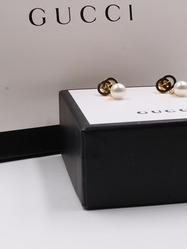 حلق قوتشي لولو ميتال ذهبي حلق gucci