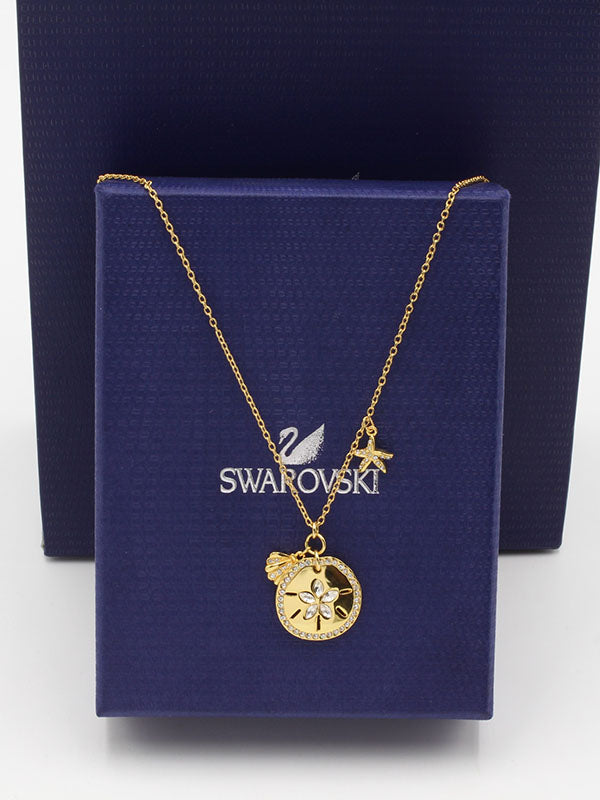 سلسال سواروفسكي سيركل اند فلاور ذهبي. سلسال Swarovski ذهبي