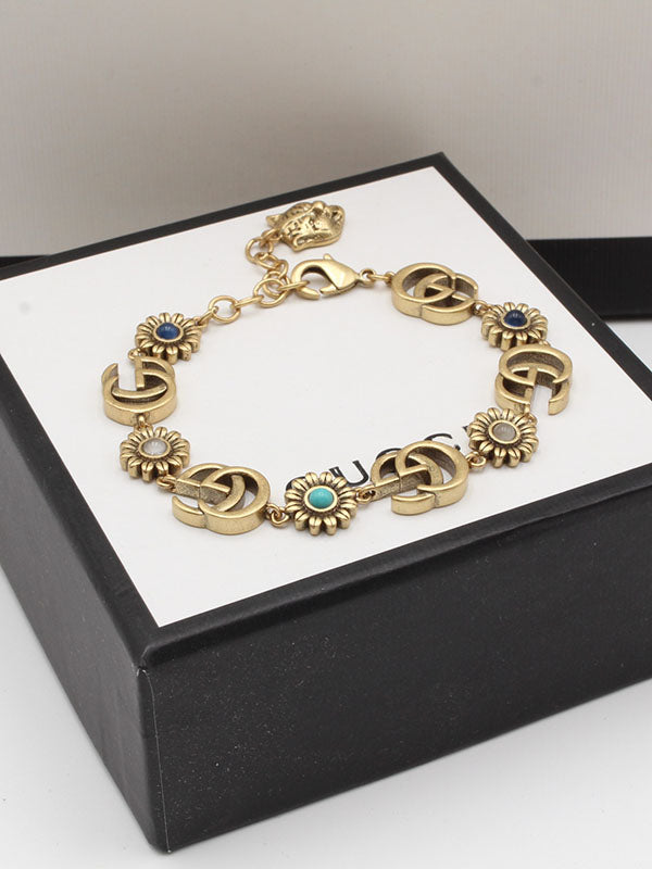 اسوارة قوتشي احجار ملونة اسواره gucci ذهبي