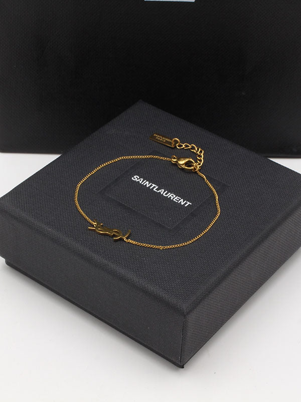 اسواره ايف سان لوران فيري سمبل اسواره ysl ذهبي