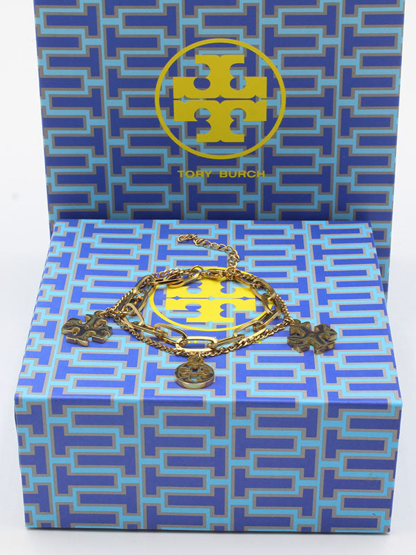 اسواره توري بورش تربل لوقو دبل شاين اسواره tory burch ذهبي