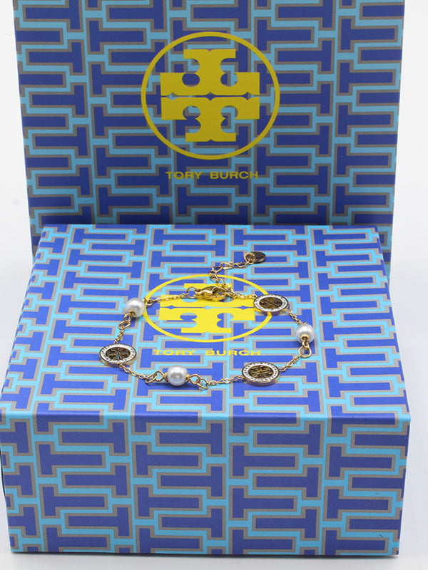 اسواره توري بورش بيرل لوقو اسواره tory burch ذهبي