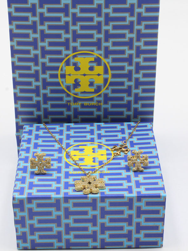 طقم توري بورش زركون ذهبي لوقو اطقم tory burch
