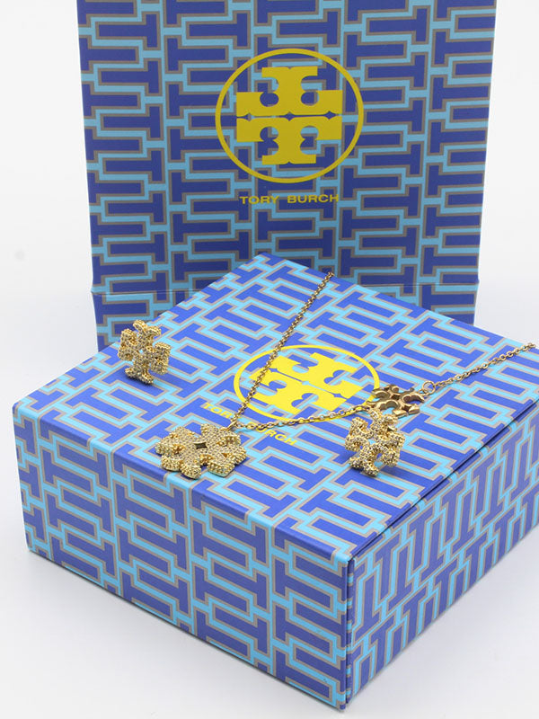 طقم توري بورش زركون ذهبي لوقو اطقم tory burch