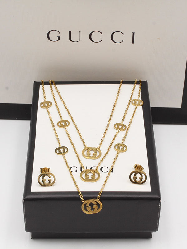 طقم قوتشي دبل شاين اطقم gucci ذهبي