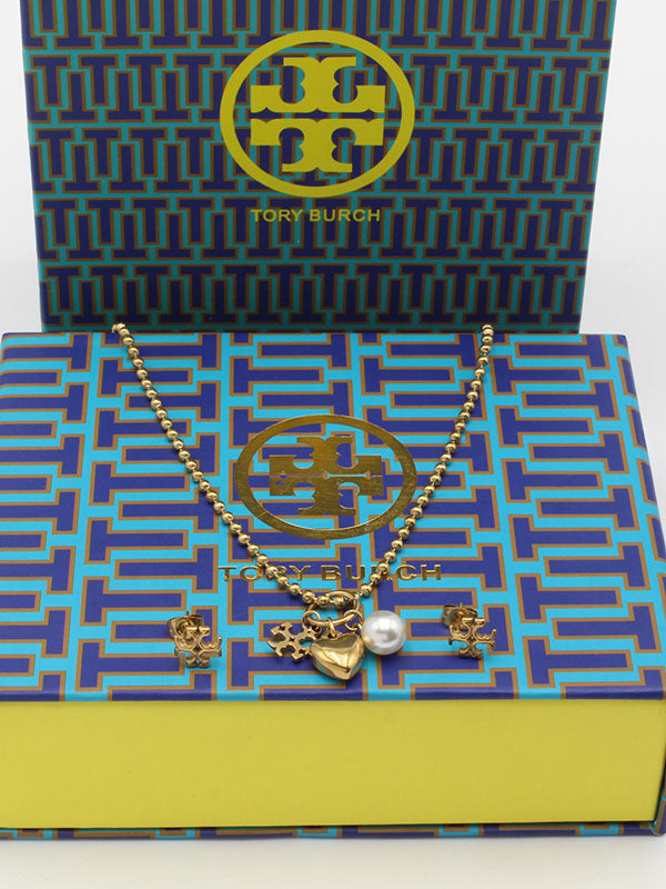 طقم توري بورش لوقو برونز اطقم tory burch