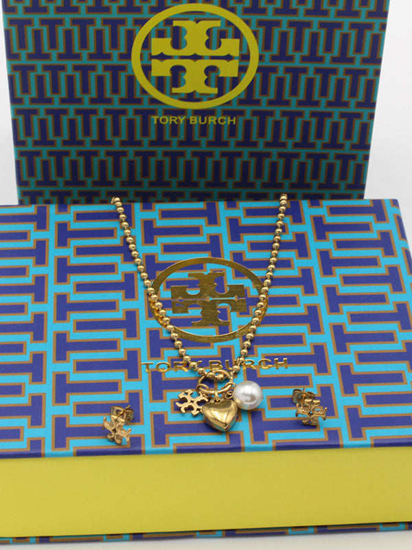 طقم توري بورش لوقو برونز اطقم tory burch