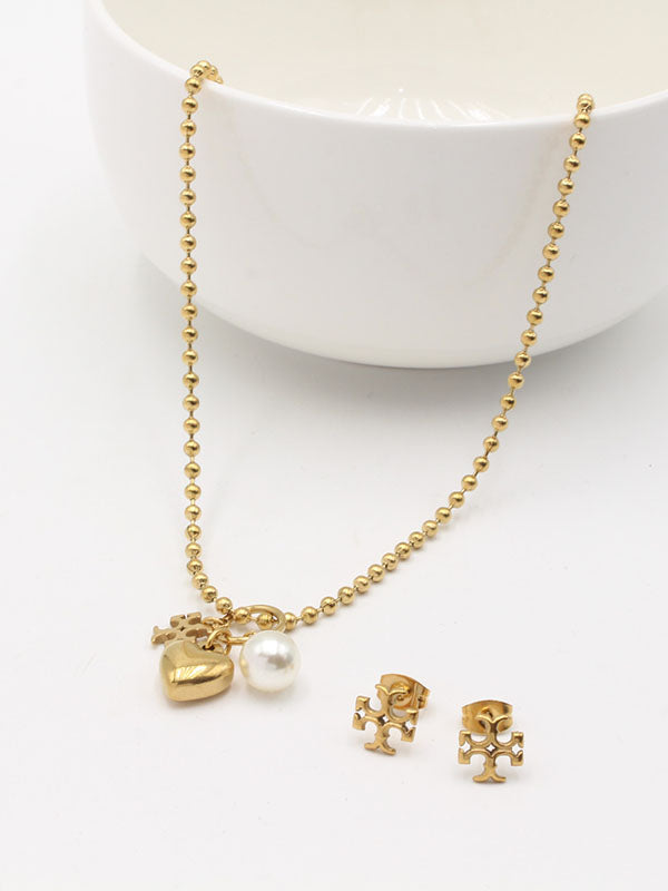 طقم توري بورش لوقو برونز اطقم tory burch