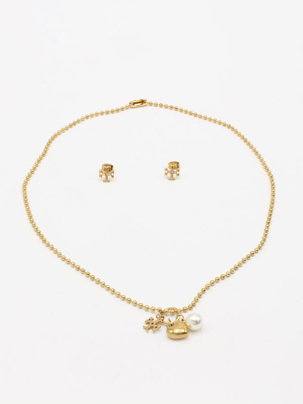 طقم توري بورش لوقو برونز اطقم tory burch