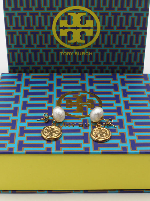 حلق توري بورش لوقو دائري اكريلك حلق tory burch ذهبي