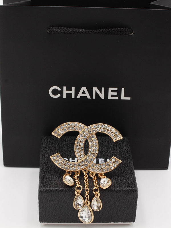 بروشات شانيل كريستال هدب بروش chanel ذهبي