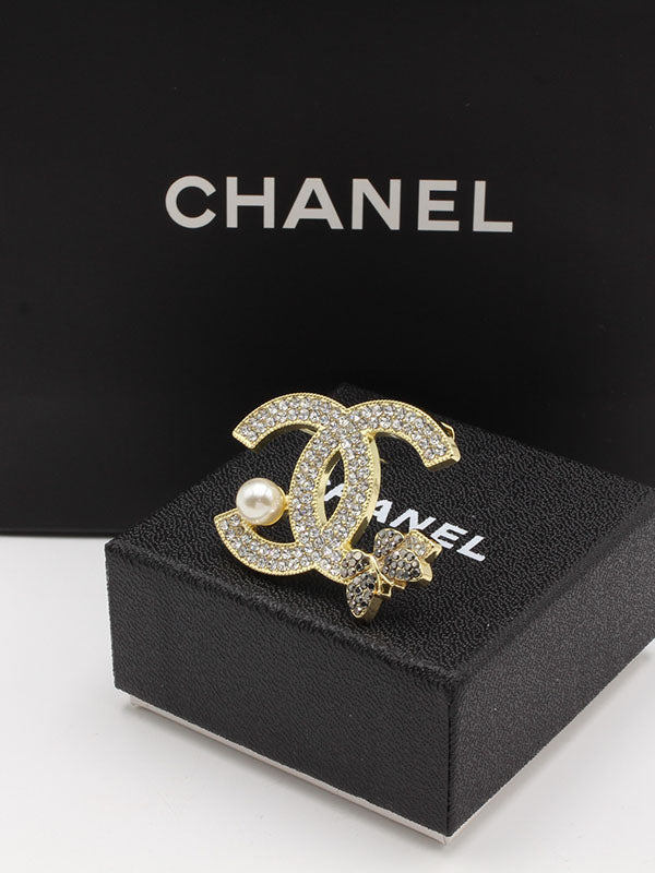 بروشات شانيل كريستال بروش chanel ذهبي