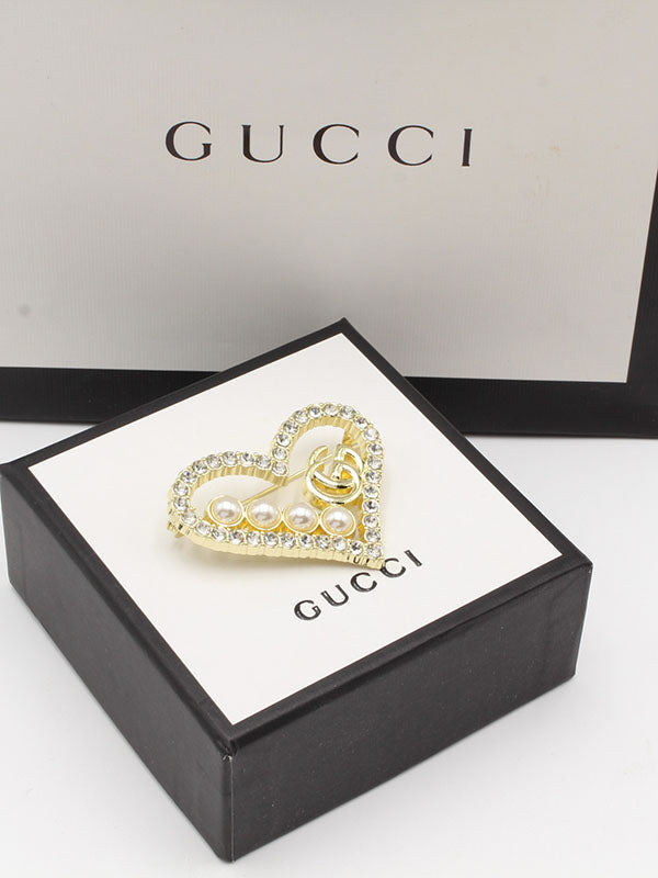 بروشات قوتشي بروش gucci