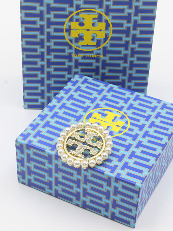 بروشات توري بورش لولو بروش tory burch ذهبي