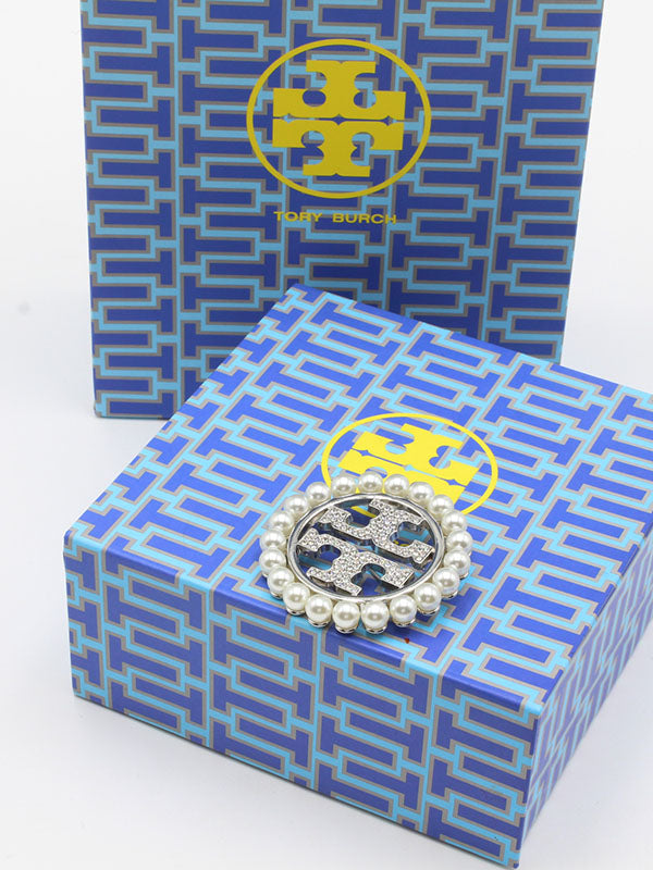 بروشات توري بورش لولو بروش tory burch فضي