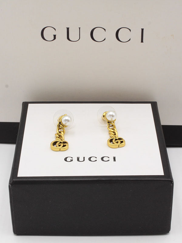 حلق قوتشي لوقو بيرل حلق gucci