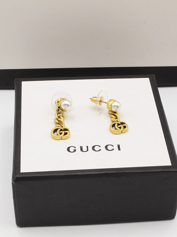 حلق قوتشي لوقو بيرل حلق gucci برونزي