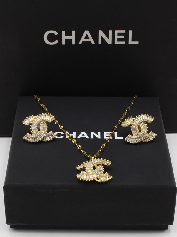 طقم شانيل زركون كيوبك ذهبي اطقم chanel