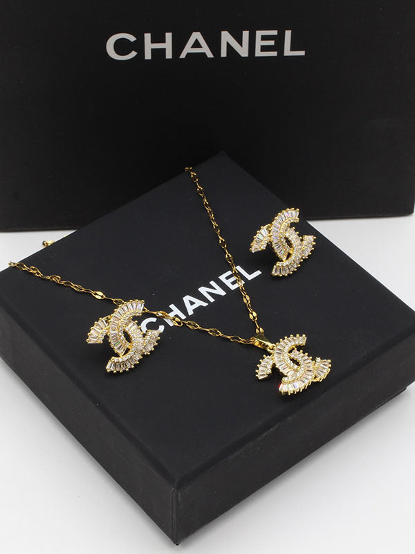 طقم شانيل زركون كيوبك ذهبي اطقم chanel