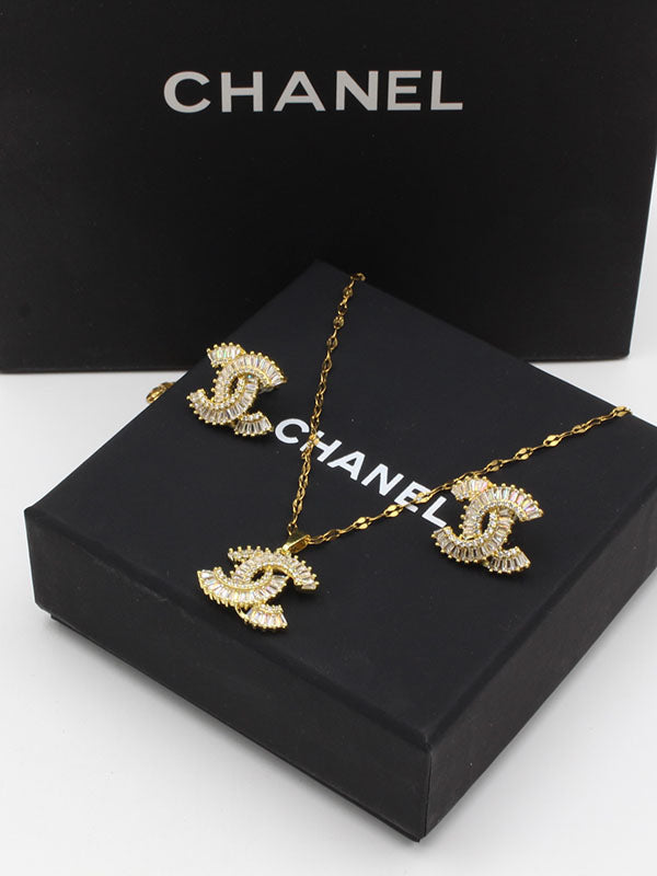 طقم شانيل زركون كيوبك ذهبي اطقم chanel