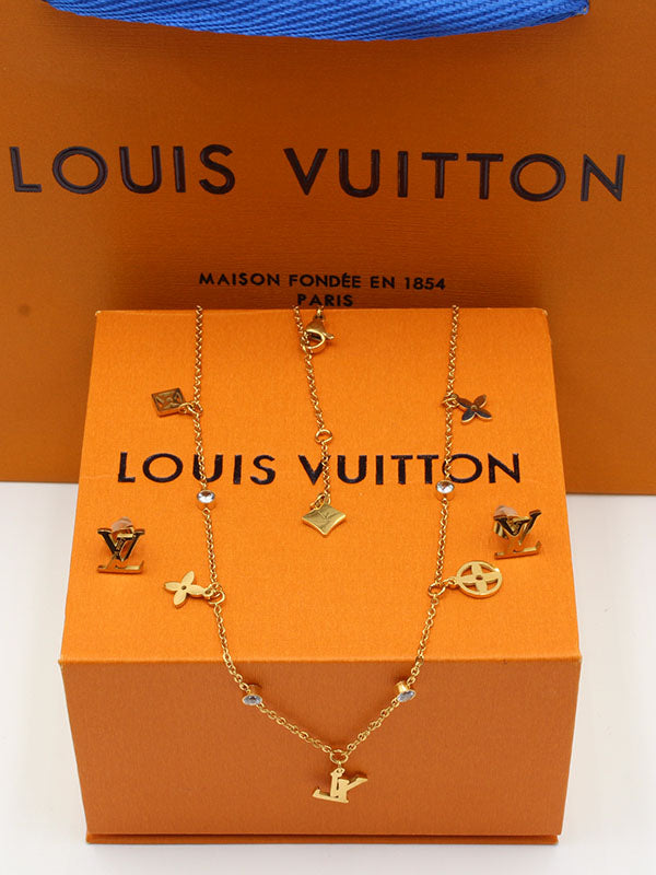 طقم لويس فيتون ذهبي 02533 اطقم louis vuitton