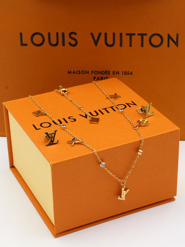 طقم لويس فيتون ذهبي 02533 اطقم louis vuitton