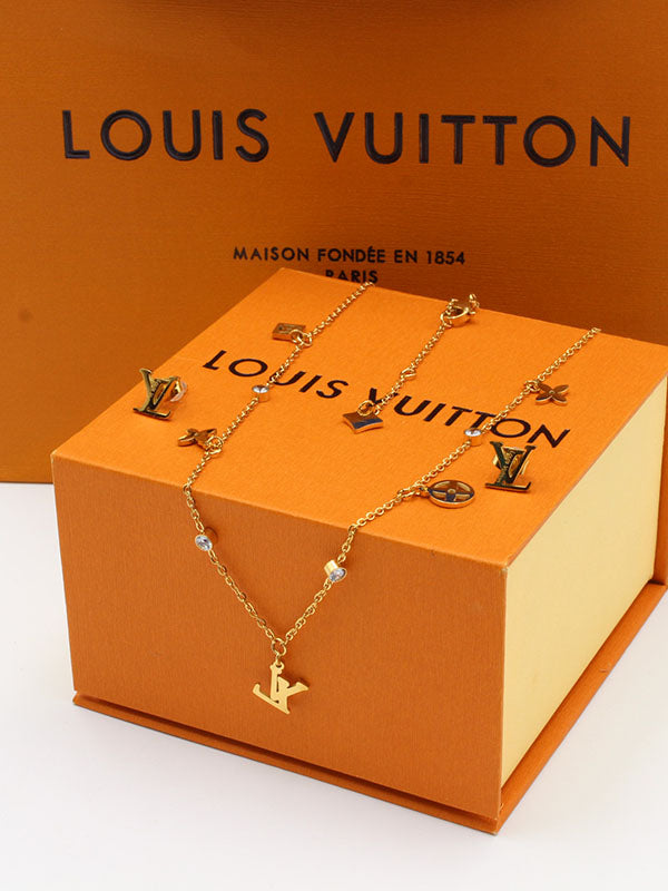 طقم لويس فيتون ذهبي 02533 اطقم louis vuitton