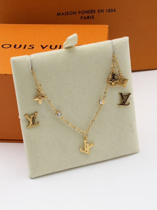طقم لويس فيتون ذهبي 02533 اطقم louis vuitton