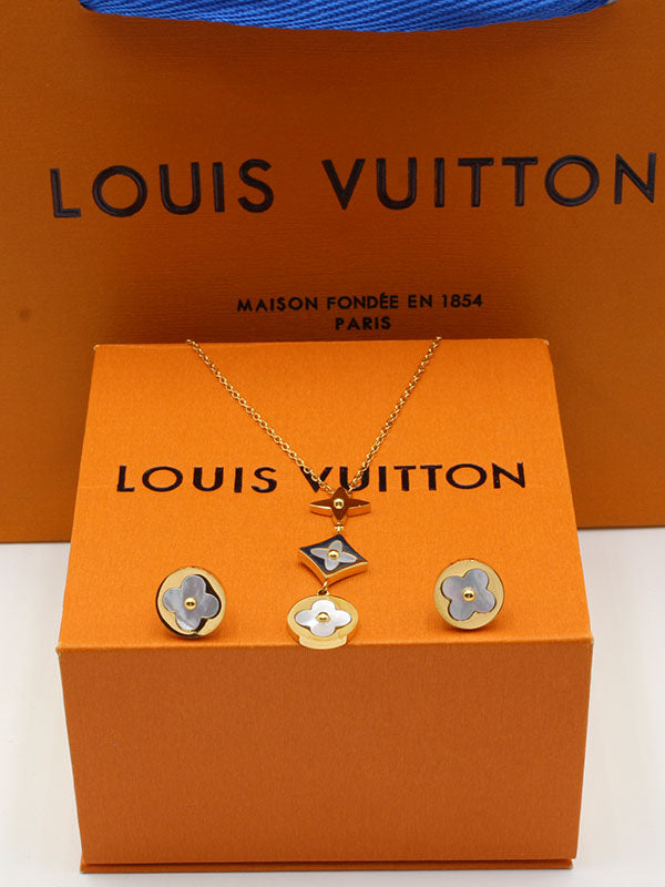 طقم لويس فيتون شيل تعليقة طويلة اطقم louis vuitton ابيض ذهبي