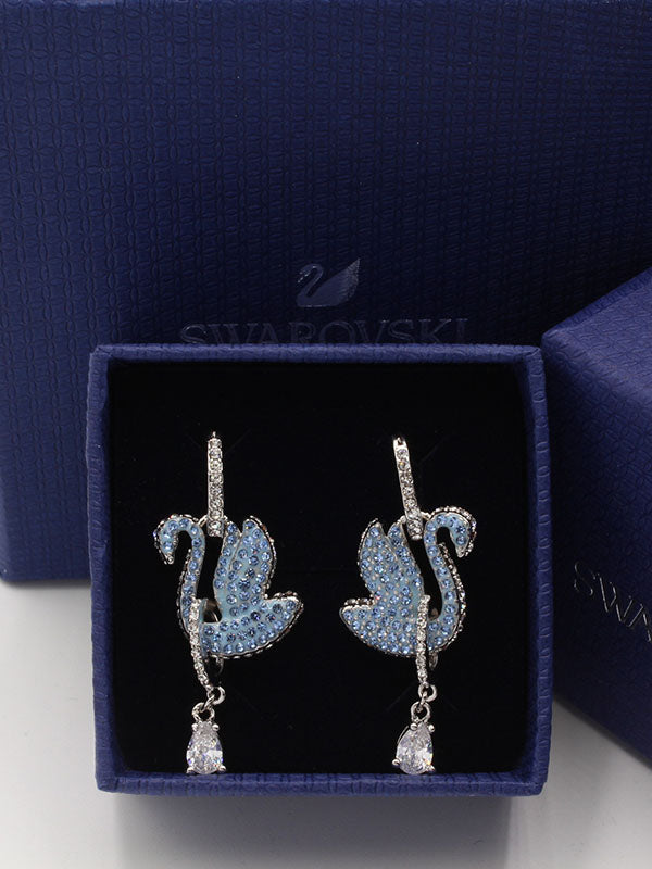 حلق سواروفسكي سوان زركون سماوي لوقو حلق Swarovski