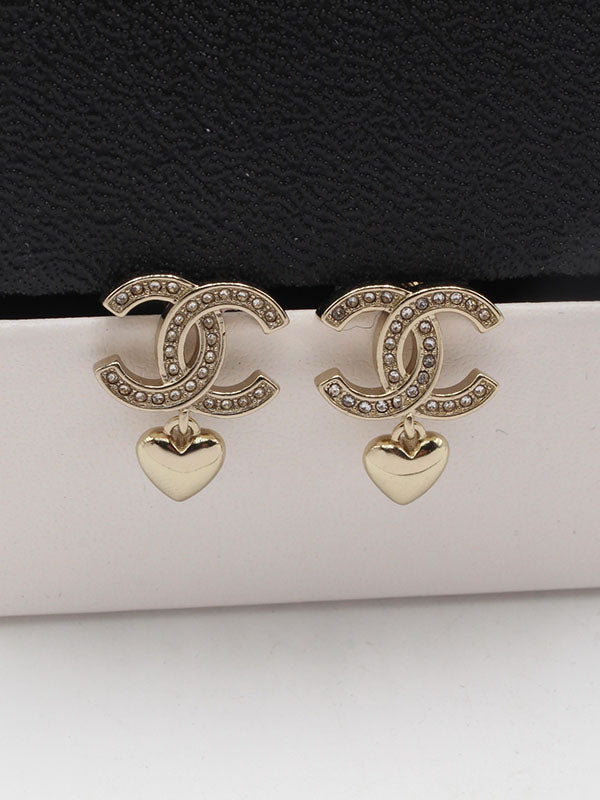 حلق شانيل ذهبي انتيك حلق chanel برونزي