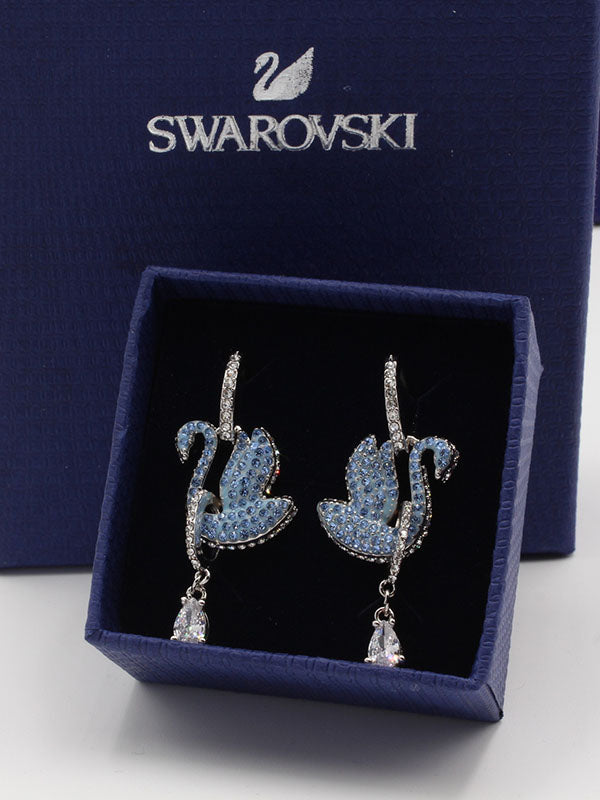 حلق سواروفسكي سوان زركون سماوي لوقو حلق Swarovski فضي