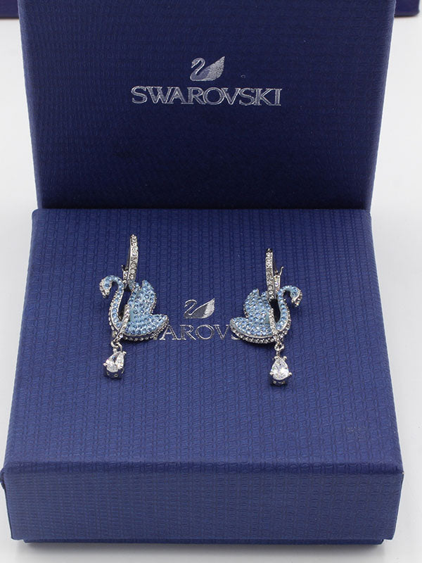 حلق سواروفسكي سوان زركون سماوي لوقو حلق Swarovski