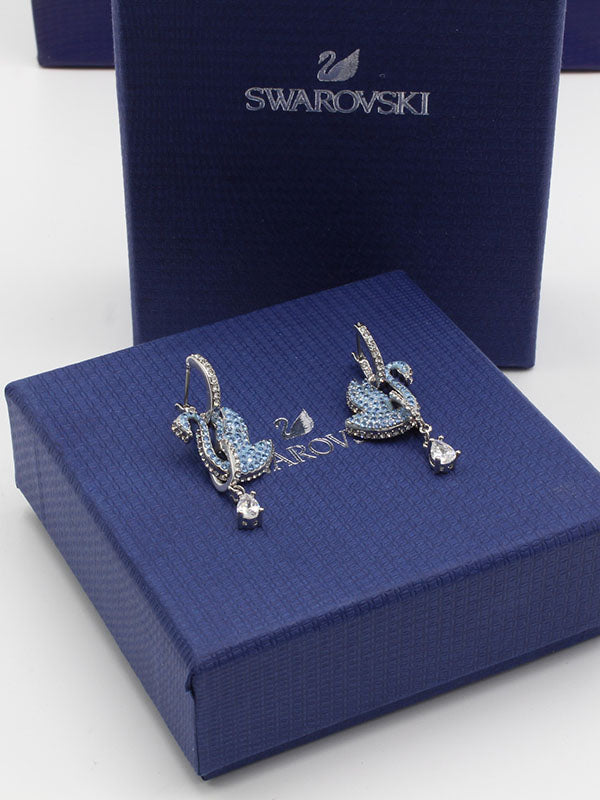 حلق سواروفسكي سوان زركون سماوي لوقو حلق Swarovski