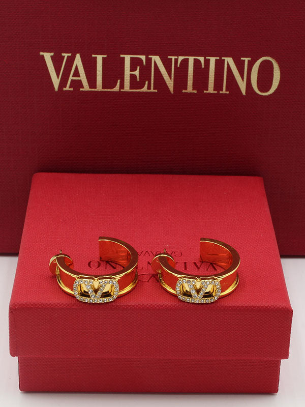 حلق فالنتينو سيركل زركون لوقو حلق VALENTINO ذهبي