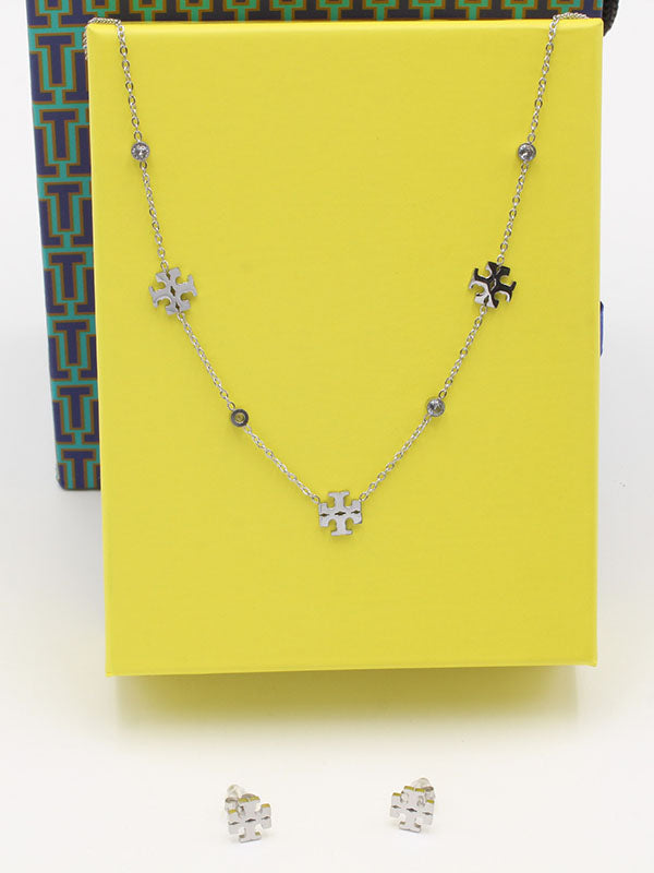 طقم توري بورش تشوكر اطقم tory burch فضي