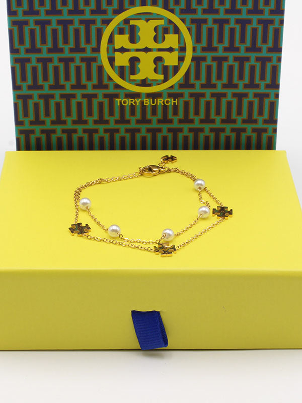 اسواره توري بورش لولو دورين اسواره tory burch