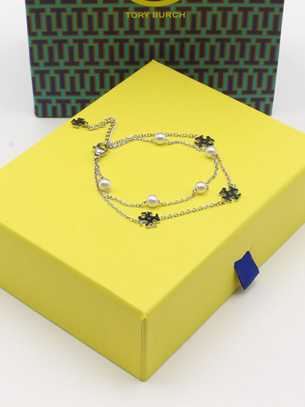 اسواره توري بورش لولو دورين اسواره tory burch فضي