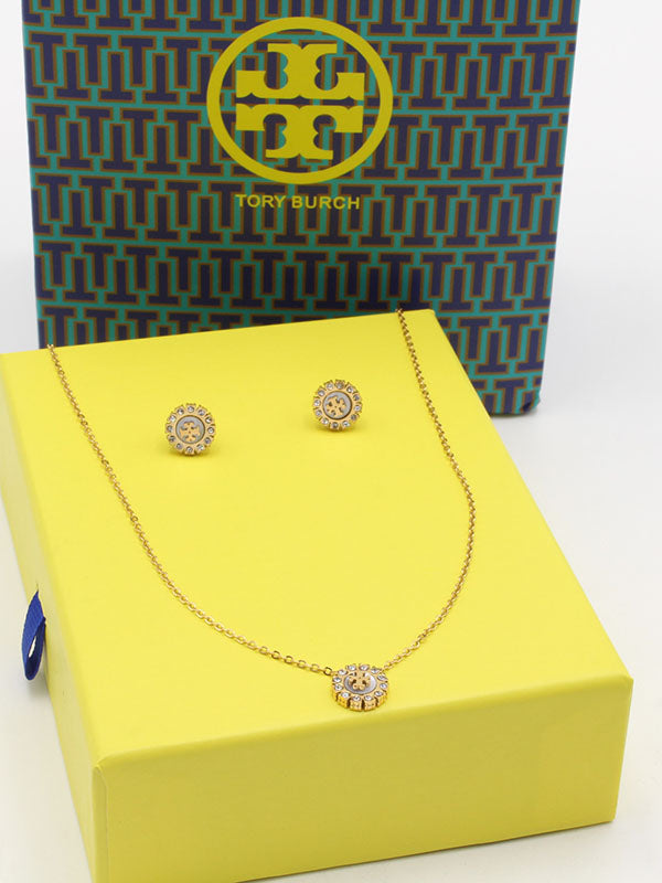 طقم توري بورش تشوكر شيل اطقم tory burch ابيض ذهبي