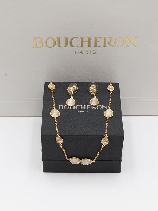 طقم بوشرون ذهبي بصدف ابيض اطقم bucheron