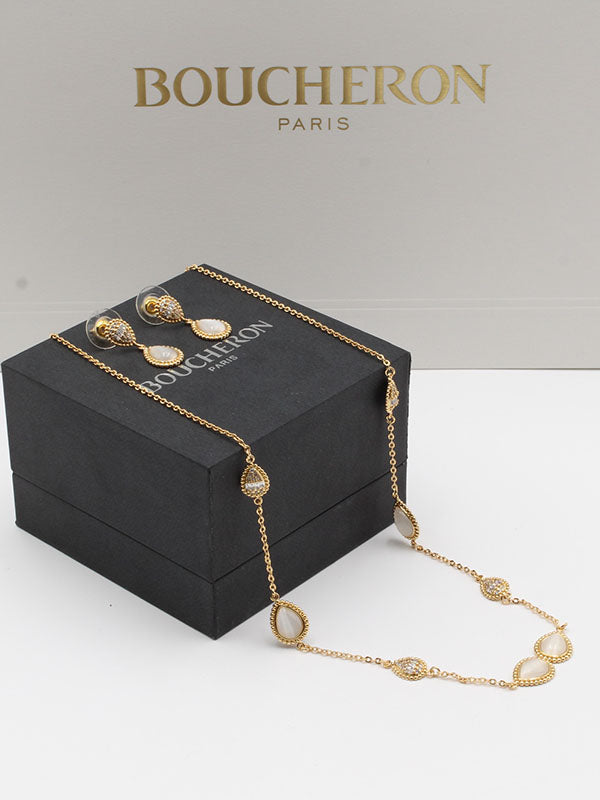 طقم بوشرون ذهبي بصدف ابيض اطقم bucheron