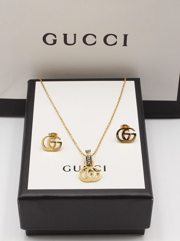 طقم قوتشي قولد بندنت لوقو اطقم gucci