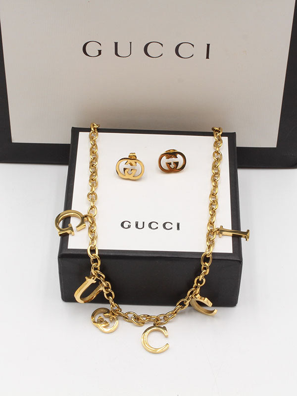 طقم قوتشي لوقو 2 قطع اطقم gucci