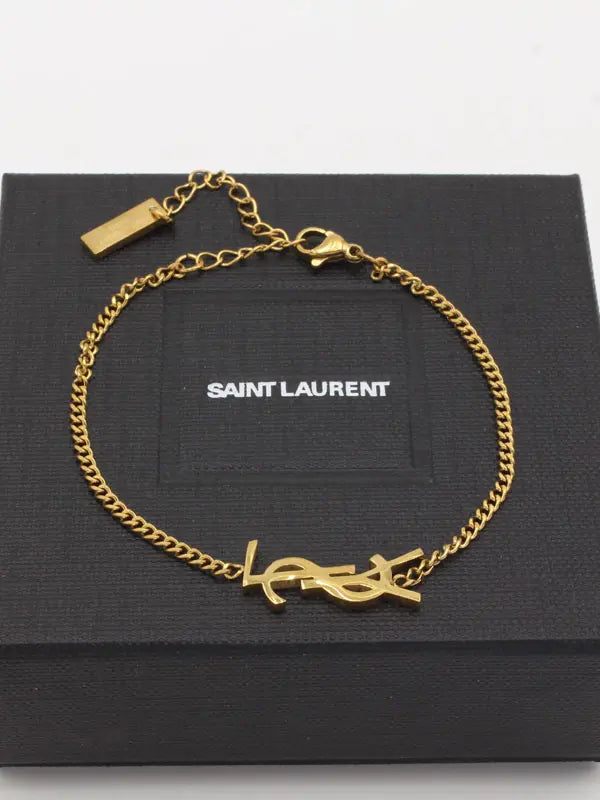 اسوارة ايف سان لوران سمبل شاين اسواره ysl