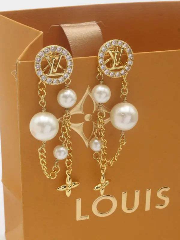حلق لويس فيتون لونق بيرل زركون ماستر 701 حلق louis vuitton