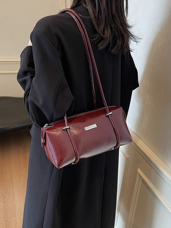 شنطة برغندي وسط شنط وحقائب new