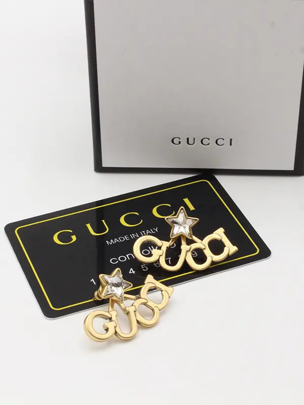 حلق قوتشي لوقو مطفي حلق gucci