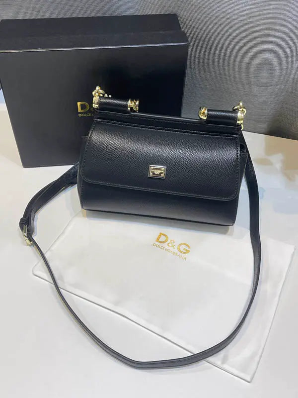شنطة دولتشي قبانا اسود جلد ماستر شنط وحقائب tory burch