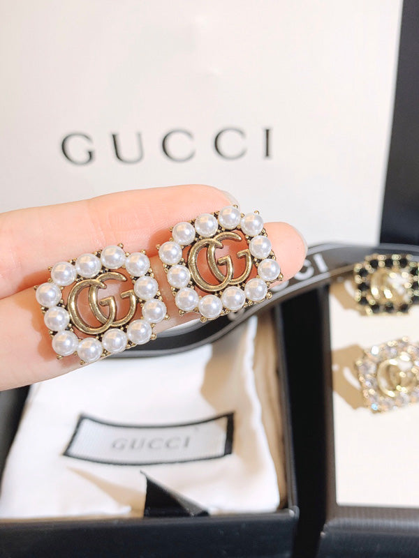 حلق قوتشي لوقو انتيك حلق gucci برونز لولو